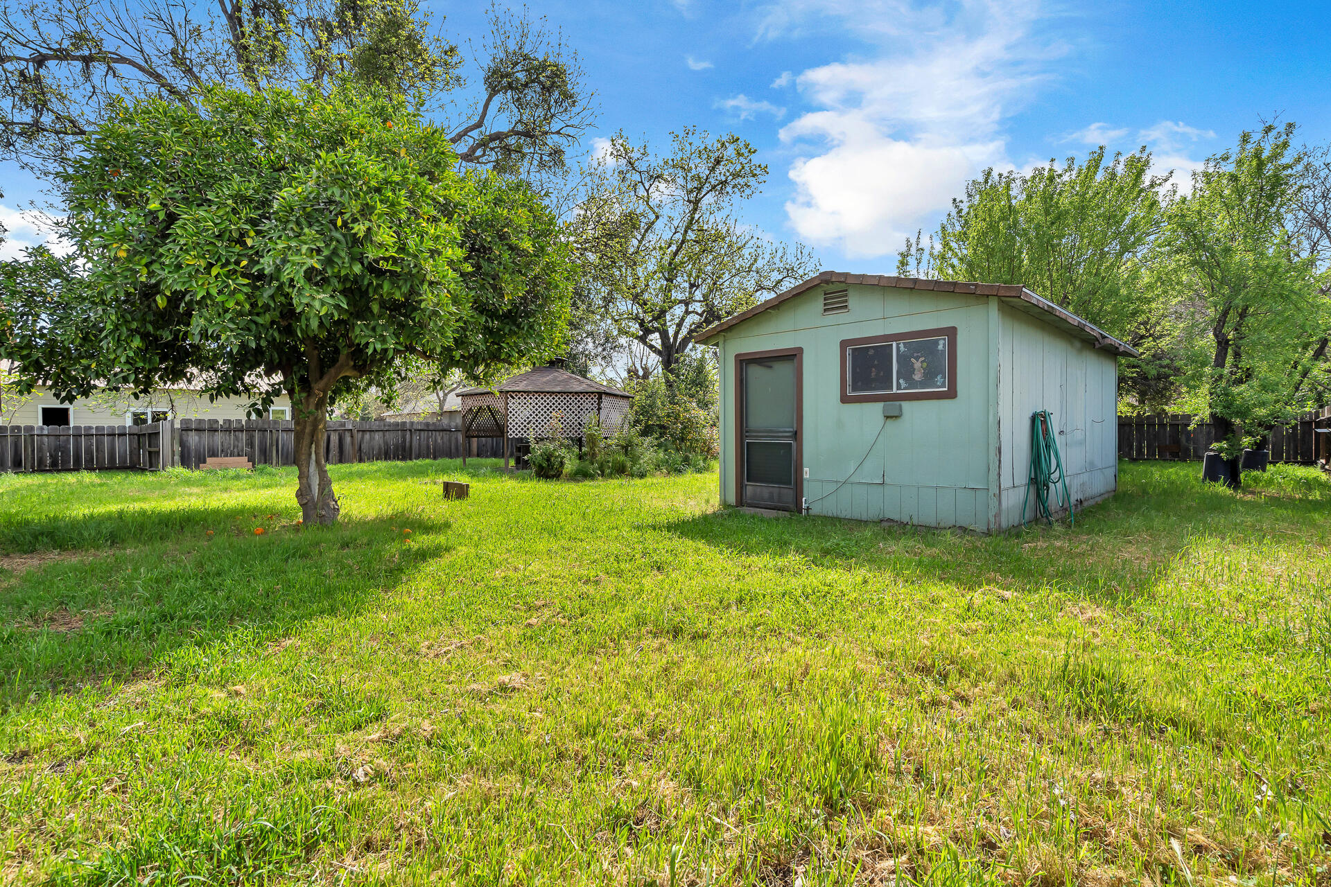 240 D Street Tehama, CA 96090 - Photo 35 of 41 a house view with a garden space
