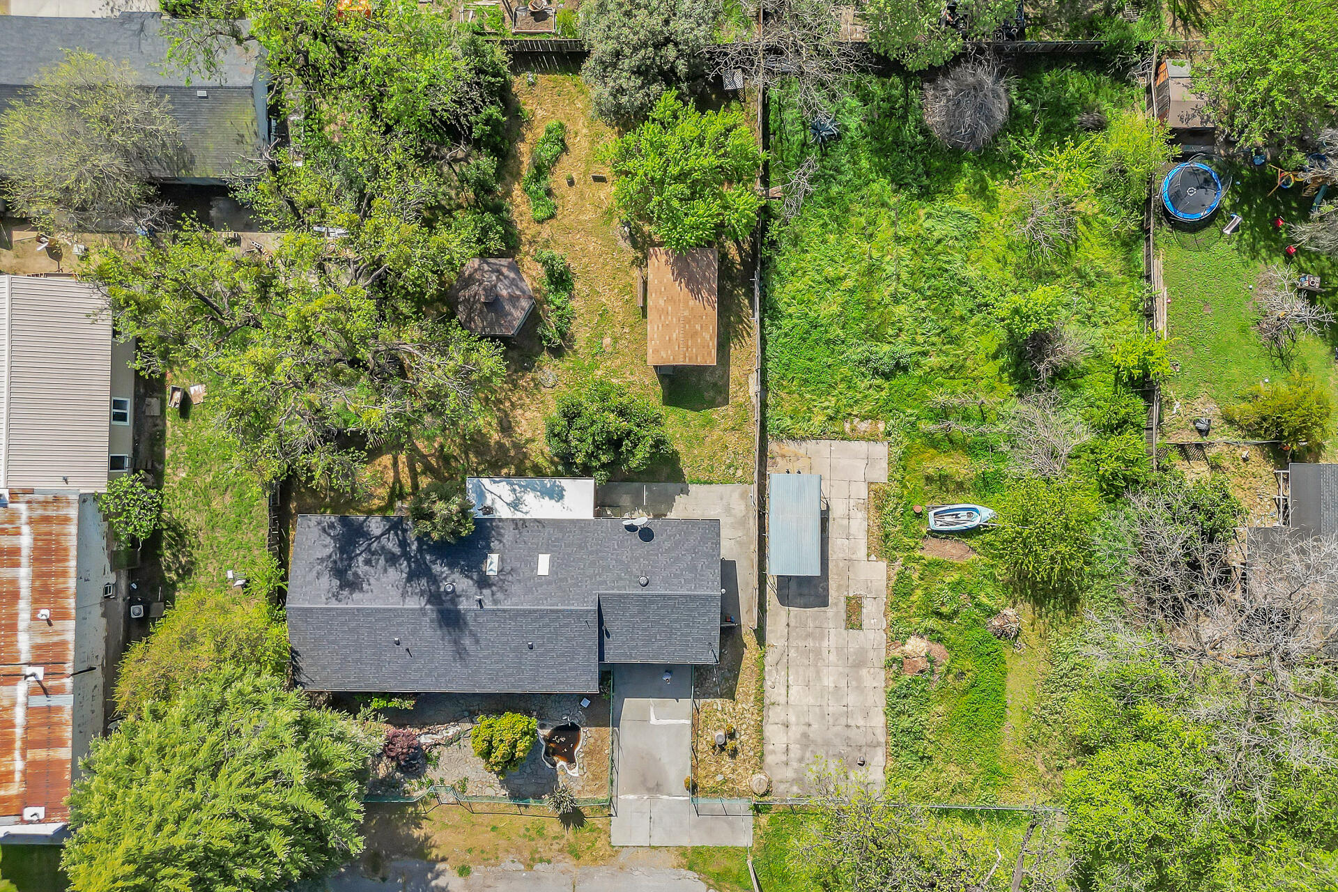 240 D Street Tehama, CA 96090 - Photo 37 of 41 an aerial view of a house with swimming pool and garden