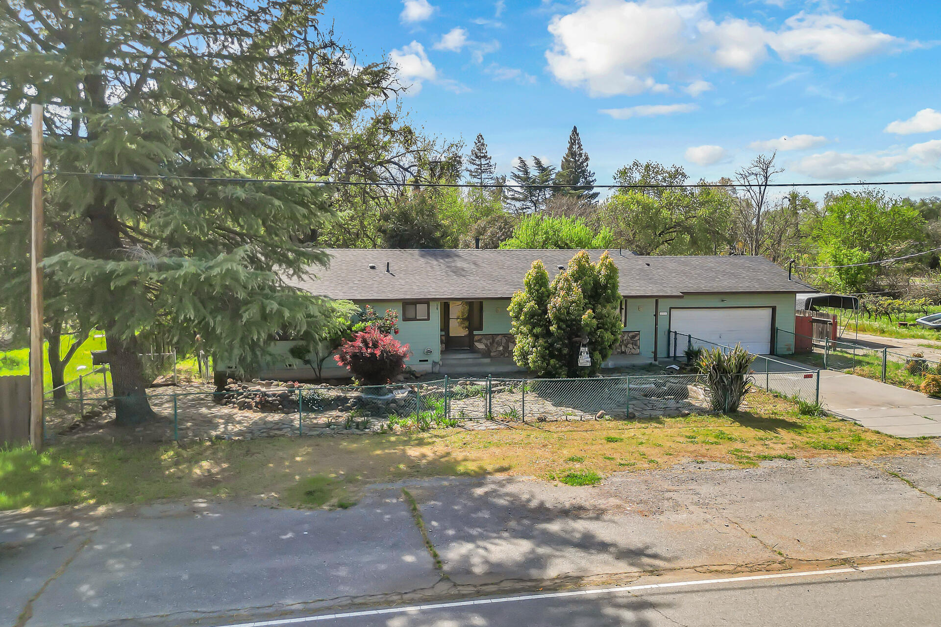 240 D Street Tehama, CA 96090 - Photo 4 of 41 a view of a house with swimming pool and sitting area