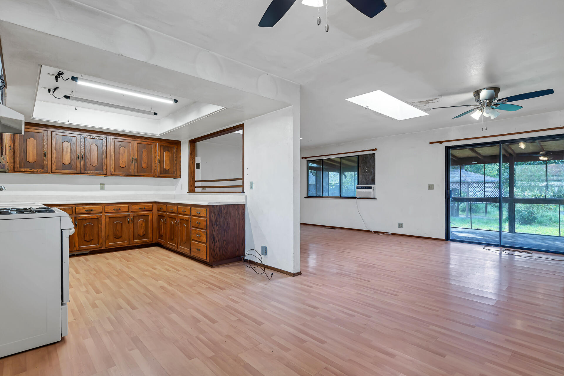 240 D Street Tehama, CA 96090 - Photo 9 of 41 a kitchen with stainless steel appliances granite countertop a stove a sink and a refrigerator
