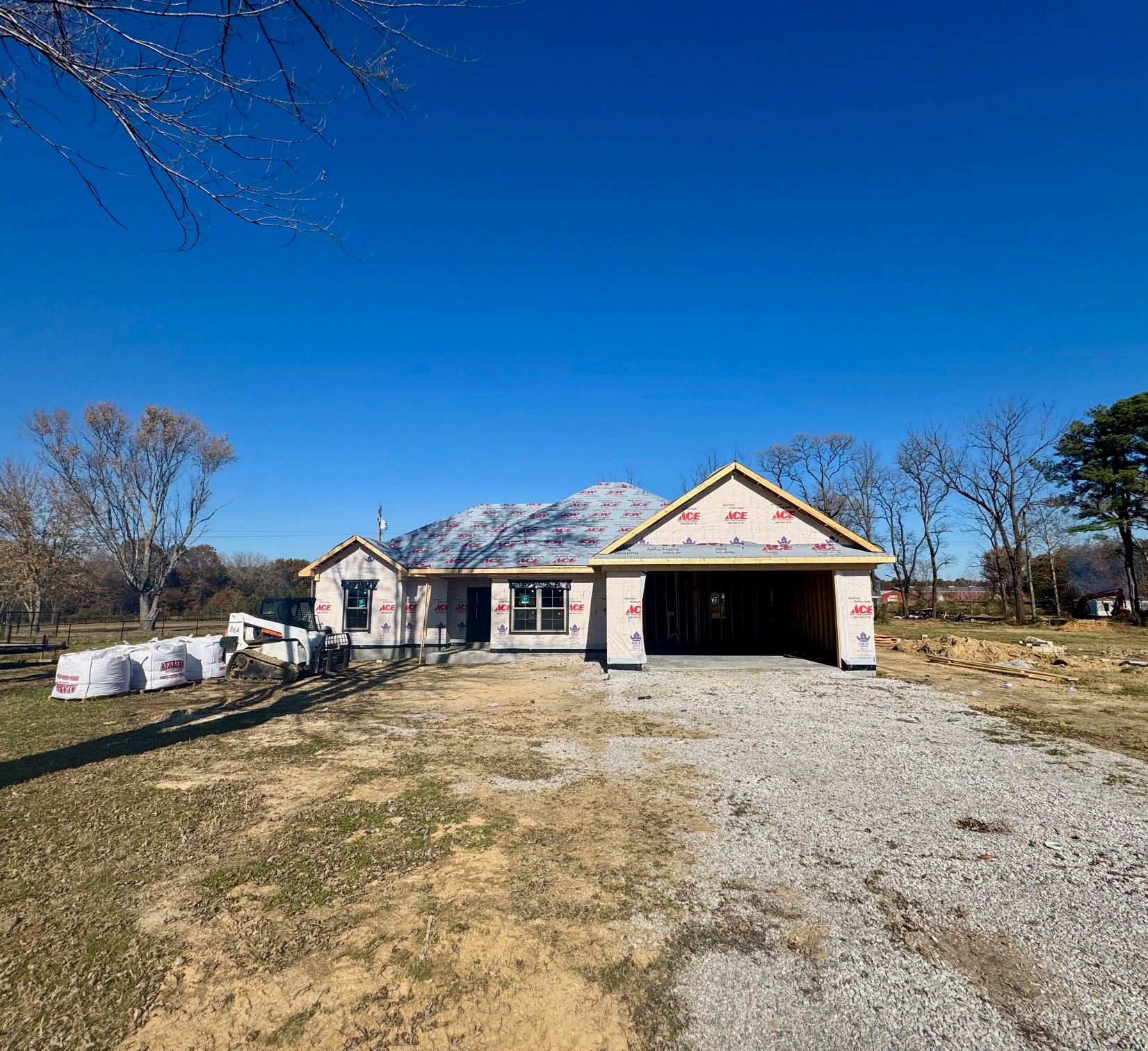 8055 State Line Road Taft, TN 38488 - Photo 2 of 2 a front view of a house with a yard and lake view