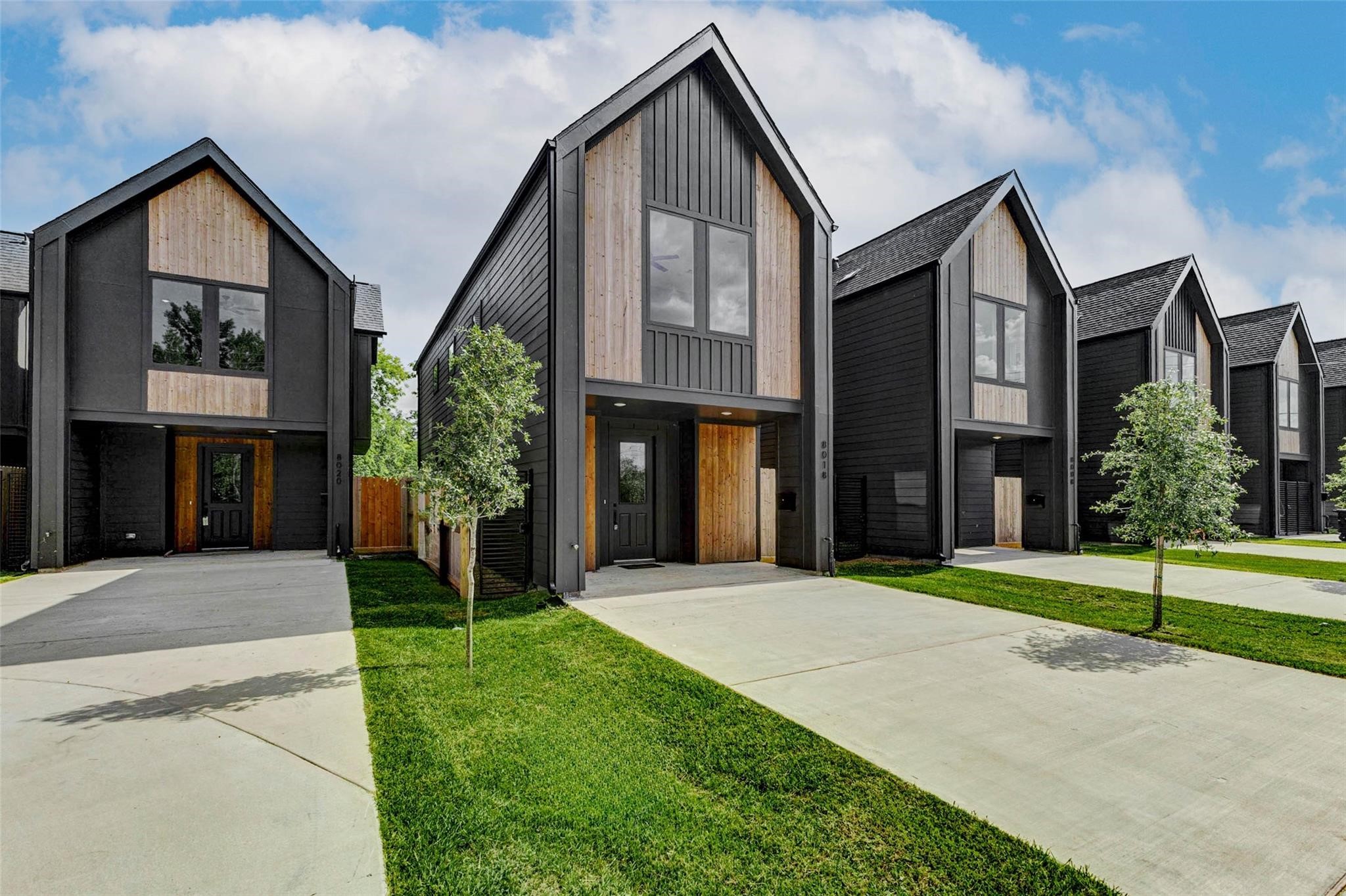 8008 Sunbury Street Houston, TX 77028 - Photo 1 of 42 a front view of a house with a yard and garage
