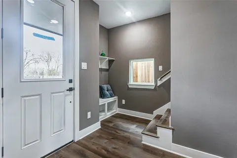 a view of entryway with wooden floor