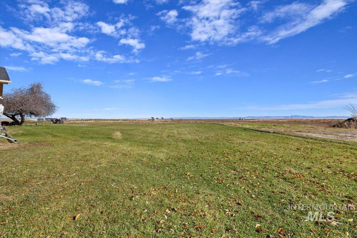 173 Main Line Ranch Road Rupert, ID 83350 - Photo 40 of 47 View of grassy yard featuring a rural view