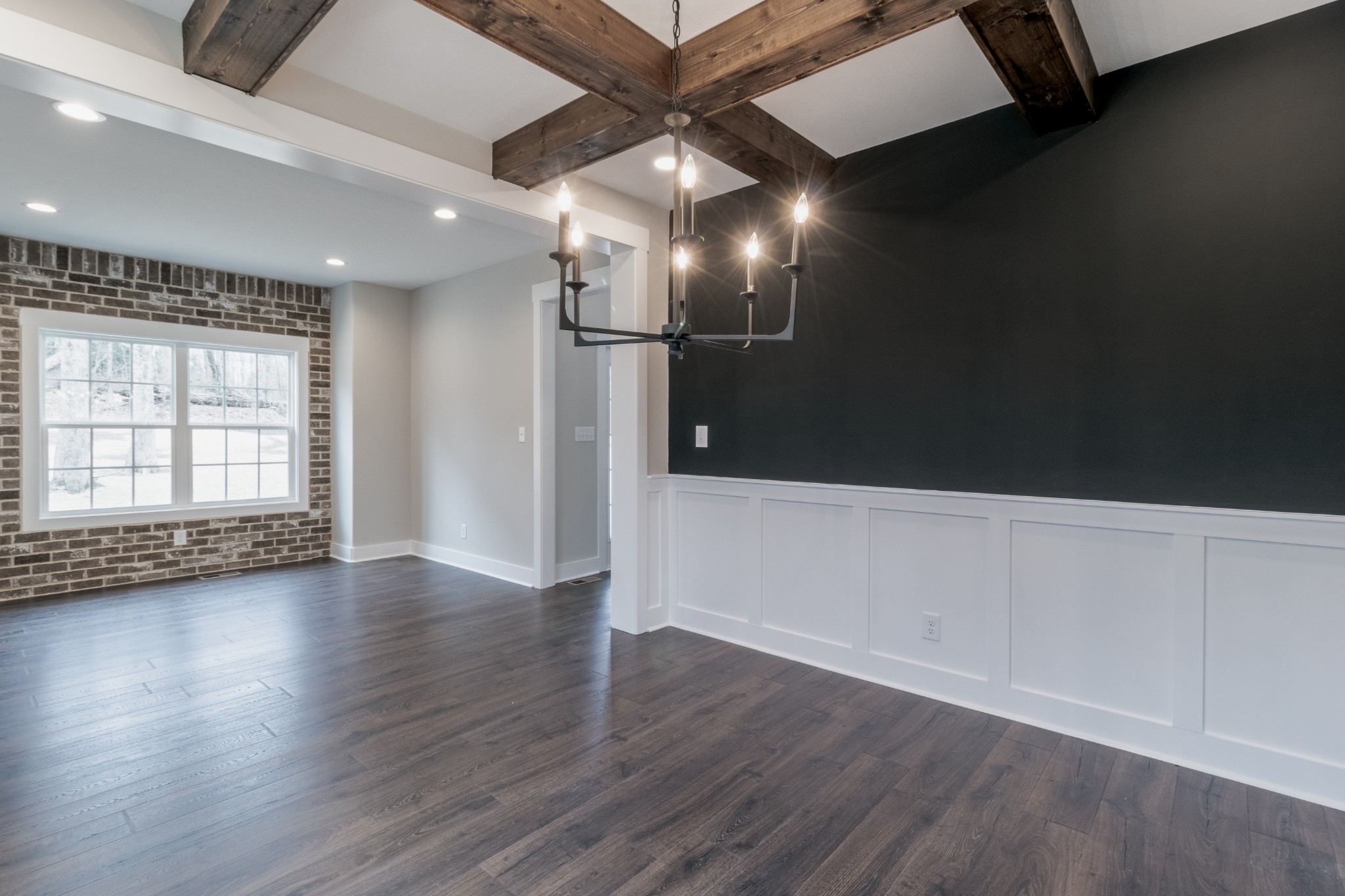 600 Swift Lane Cunningham, TN 37052 - Photo 16 of 38 an empty room with wooden floor and windows