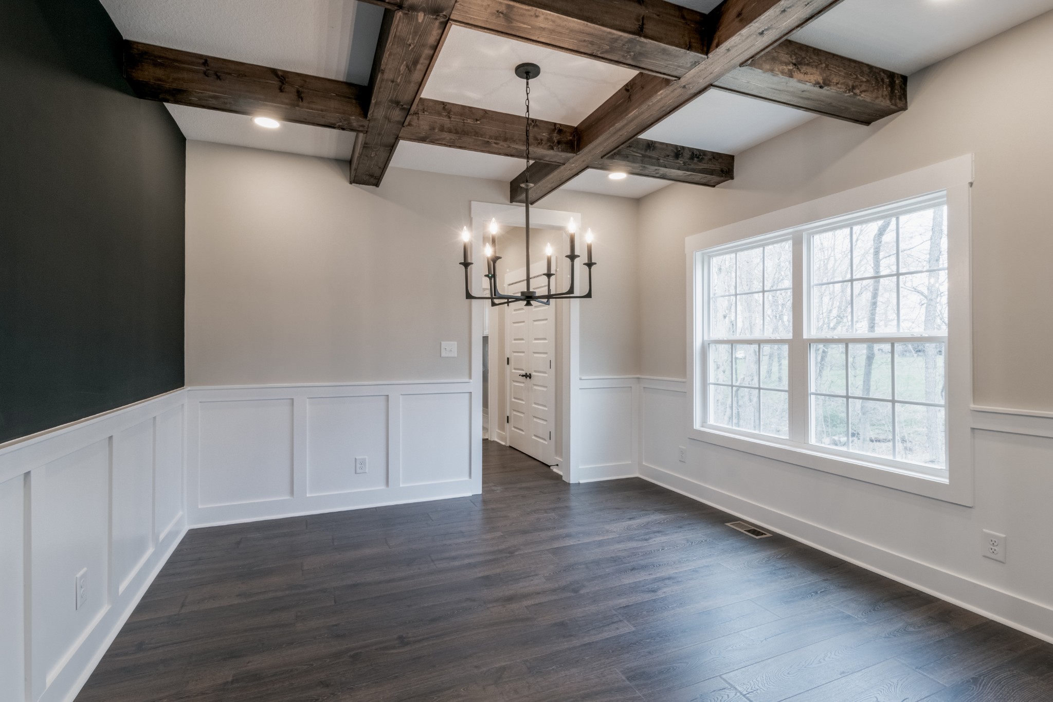 600 Swift Lane Cunningham, TN 37052 - Photo 17 of 38 an empty room with wooden floor and windows
