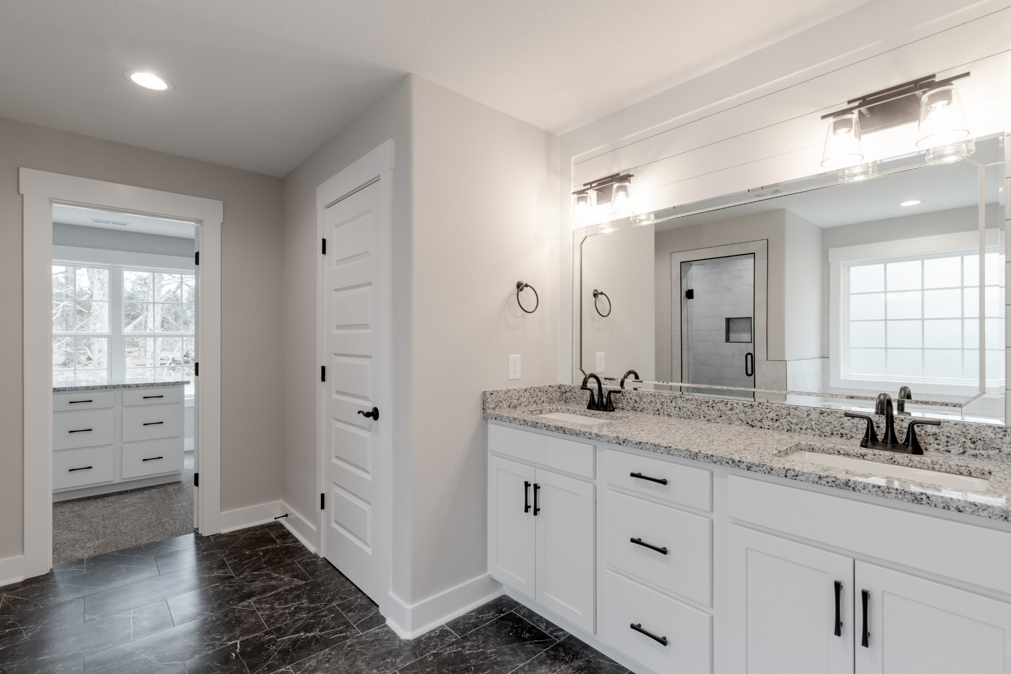 600 Swift Lane Cunningham, TN 37052 - Photo 25 of 38 a bathroom with a granite countertop sink double and mirror