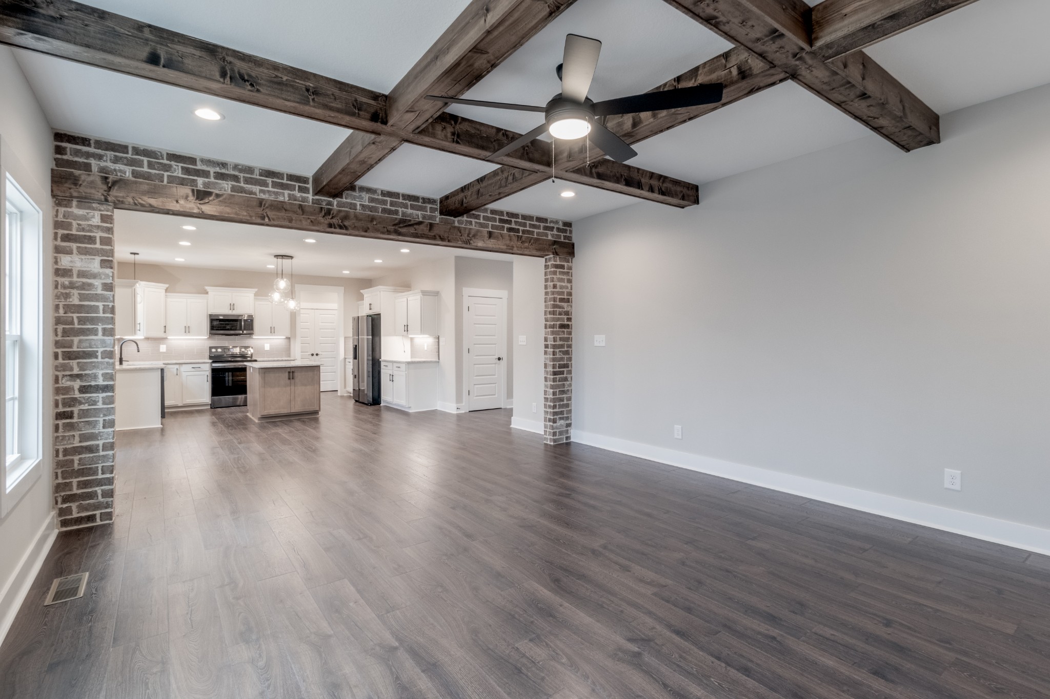 600 Swift Lane Cunningham, TN 37052 - Photo 5 of 38 a view of an empty room with wooden floor