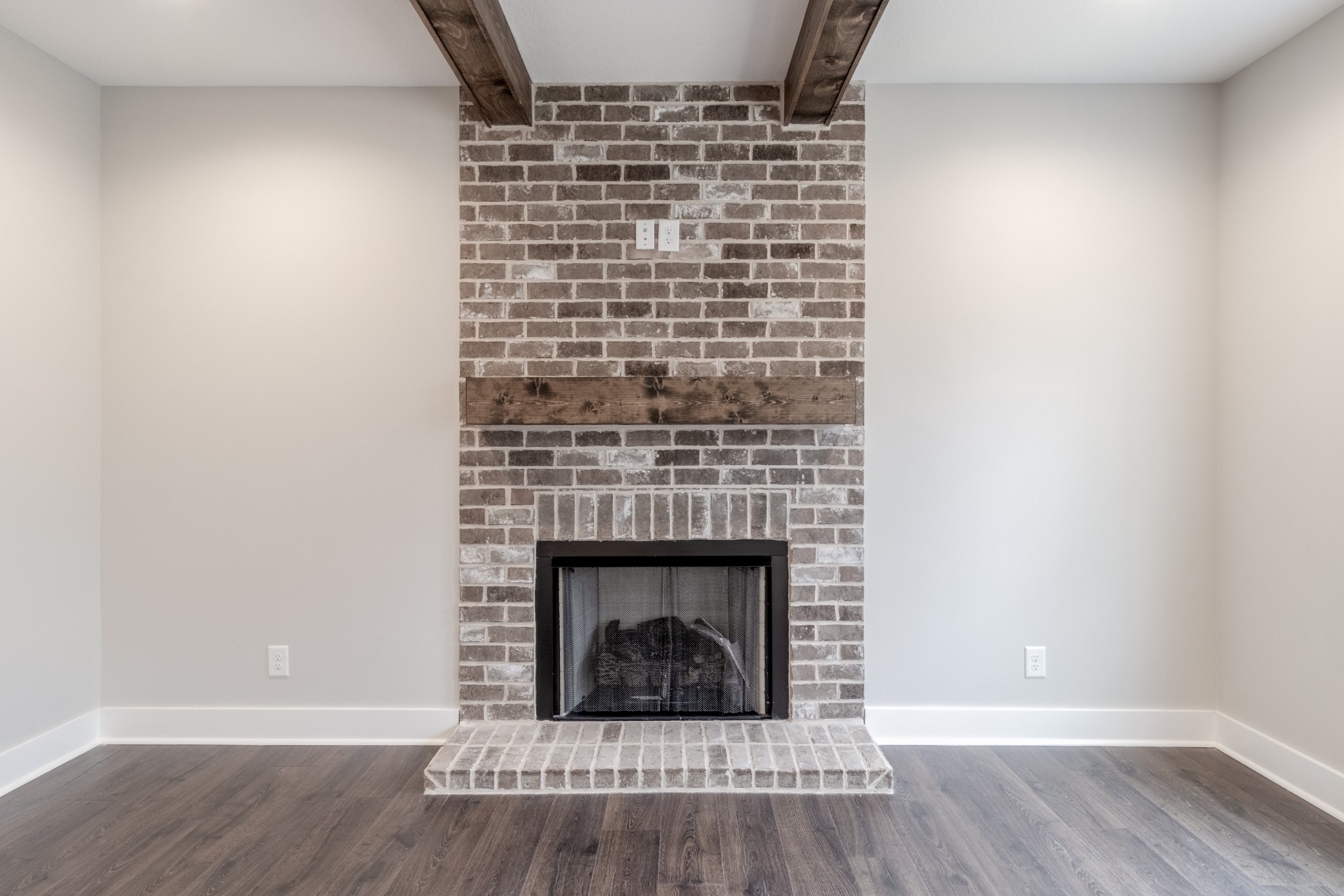 600 Swift Lane Cunningham, TN 37052 - Photo 6 of 38 a view of an empty room with wooden floor and a fireplace