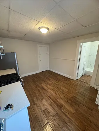 a view of a livingroom with wooden floor