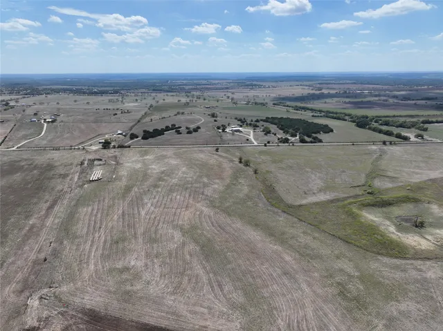 a view of a lake with beach