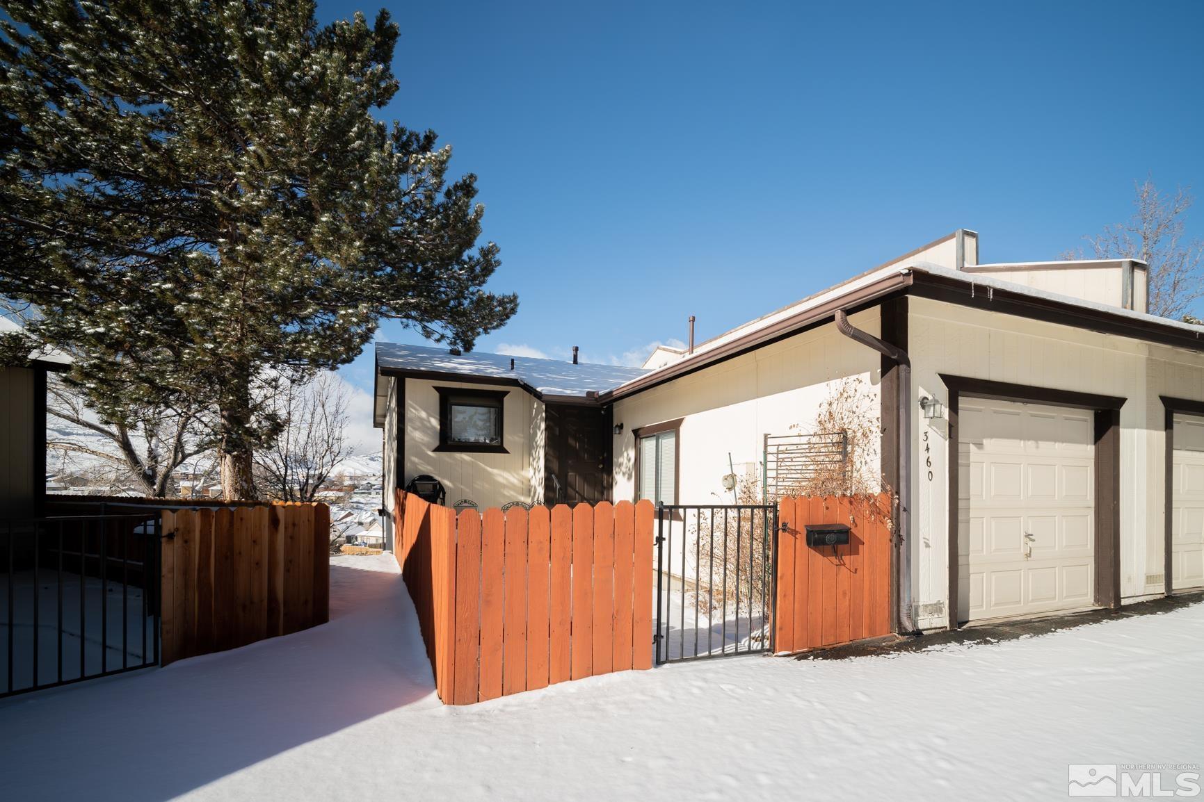 3460 Bowie Road Reno, NV 89503 - Photo 2 of 20 a view of a house with wooden fence