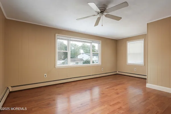 a view of a room with wooden walls