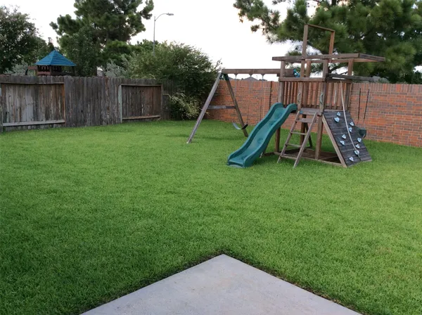 a view of a park with slide