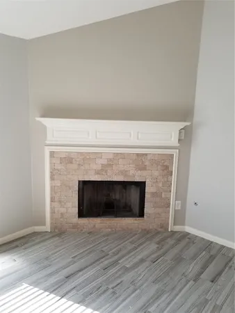 a living room with a fireplace