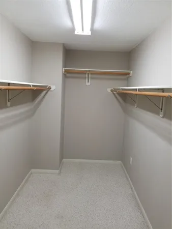 a view of a room with racks on the wall