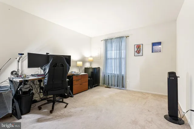 a bathroom with a sink toilet mirror and shower