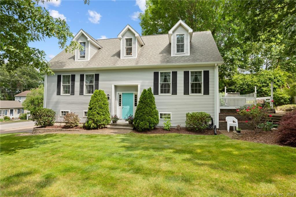 87 Bayview Road East Lyme, CT 06357 - Photo 1 of 1 a front view of a house with a yard