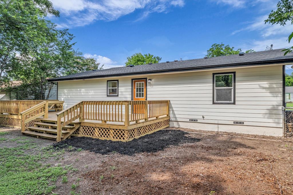 3608 North 26th Street Waco, TX 76708 - Photo 25 of 28 a view of backyard with a garden and deck
