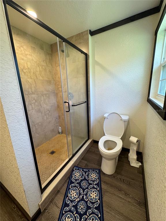 15455 Northwest 100th Avenue Road Reddick, FL 32686 - Photo 16 of 16 a bathroom with a toilet and a shower