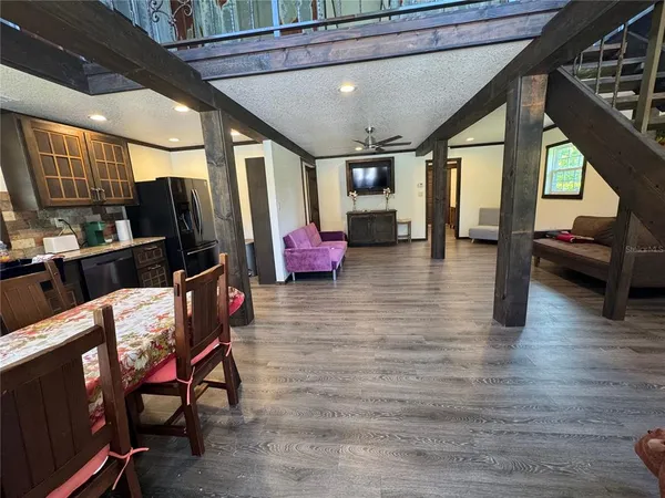 a lobby with furniture and floor to ceiling window