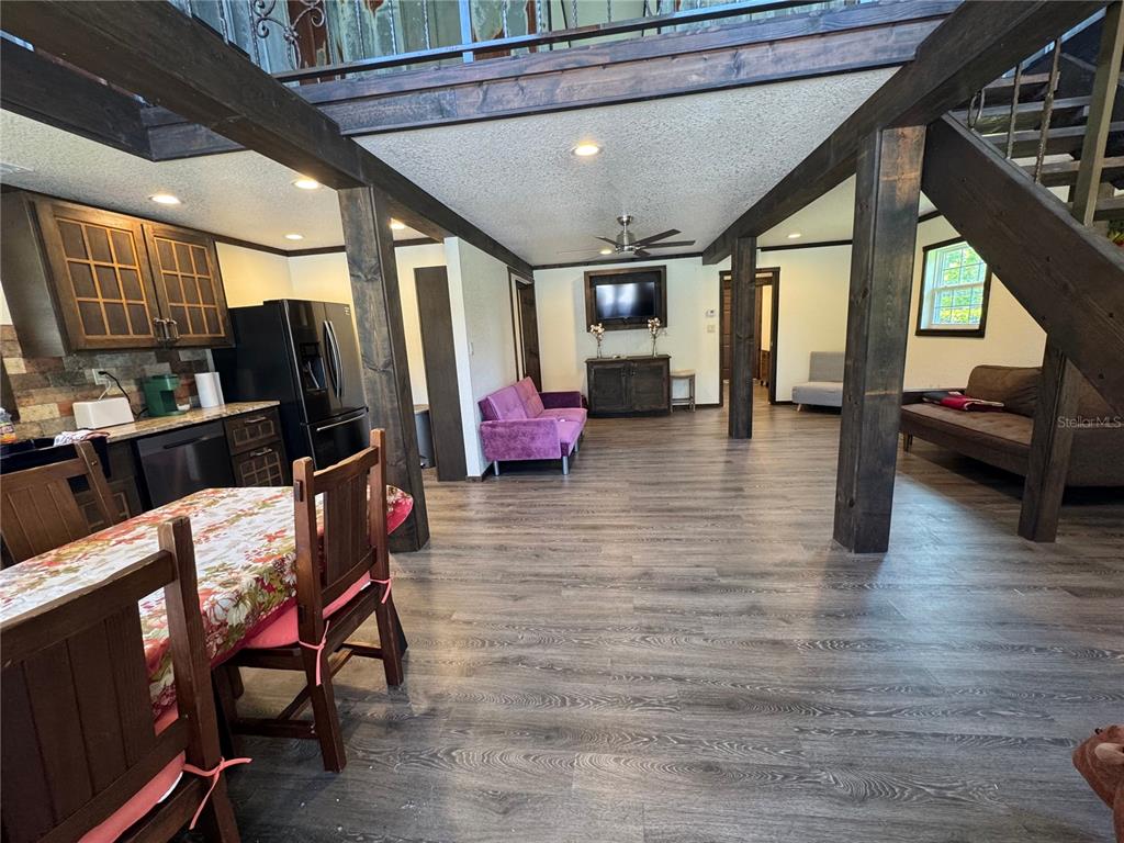 15455 Northwest 100th Avenue Road Reddick, FL 32686 - Photo 2 of 16 a lobby with furniture and floor to ceiling window