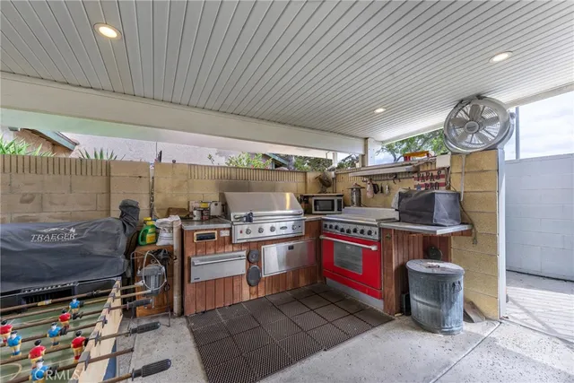a living room with lots of furniture and white walls