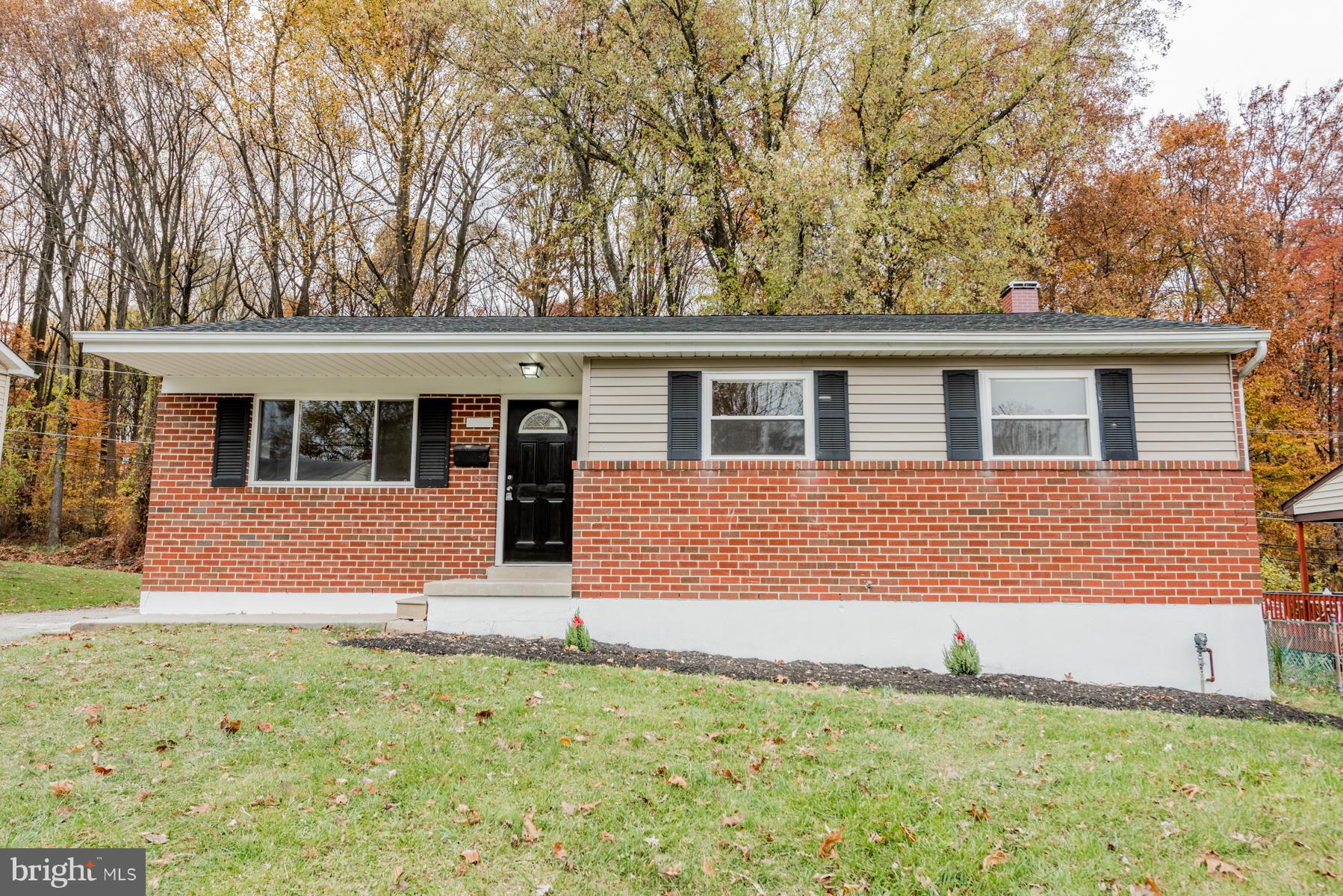 3812 Collier Road Randallstown, MD 21133 - Photo 1 of 27 front view of house with a yard