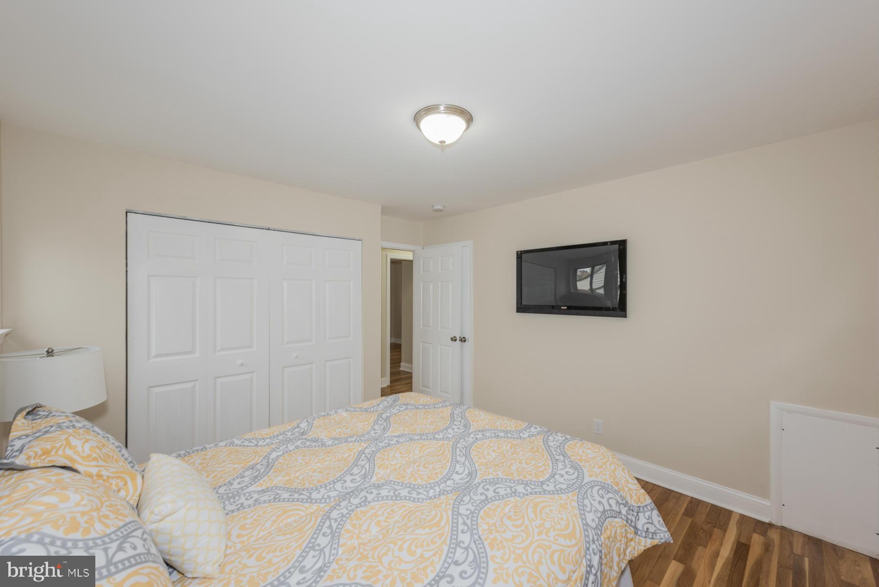 3812 Collier Road Randallstown, MD 21133 - Photo 14 of 27 a bedroom with a bed and a view of bedroom
