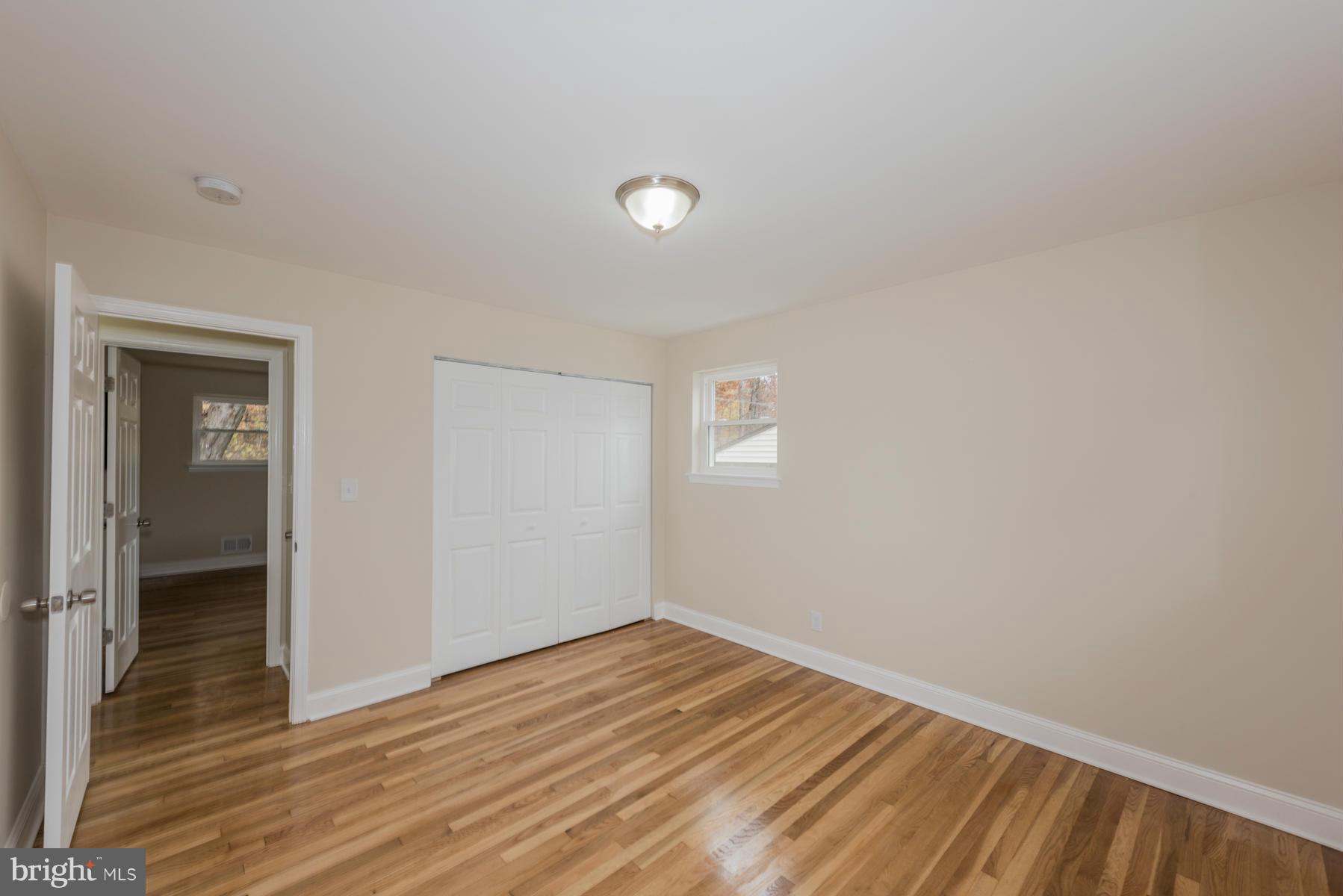 3812 Collier Road Randallstown, MD 21133 - Photo 17 of 27 wooden floor in an empty room