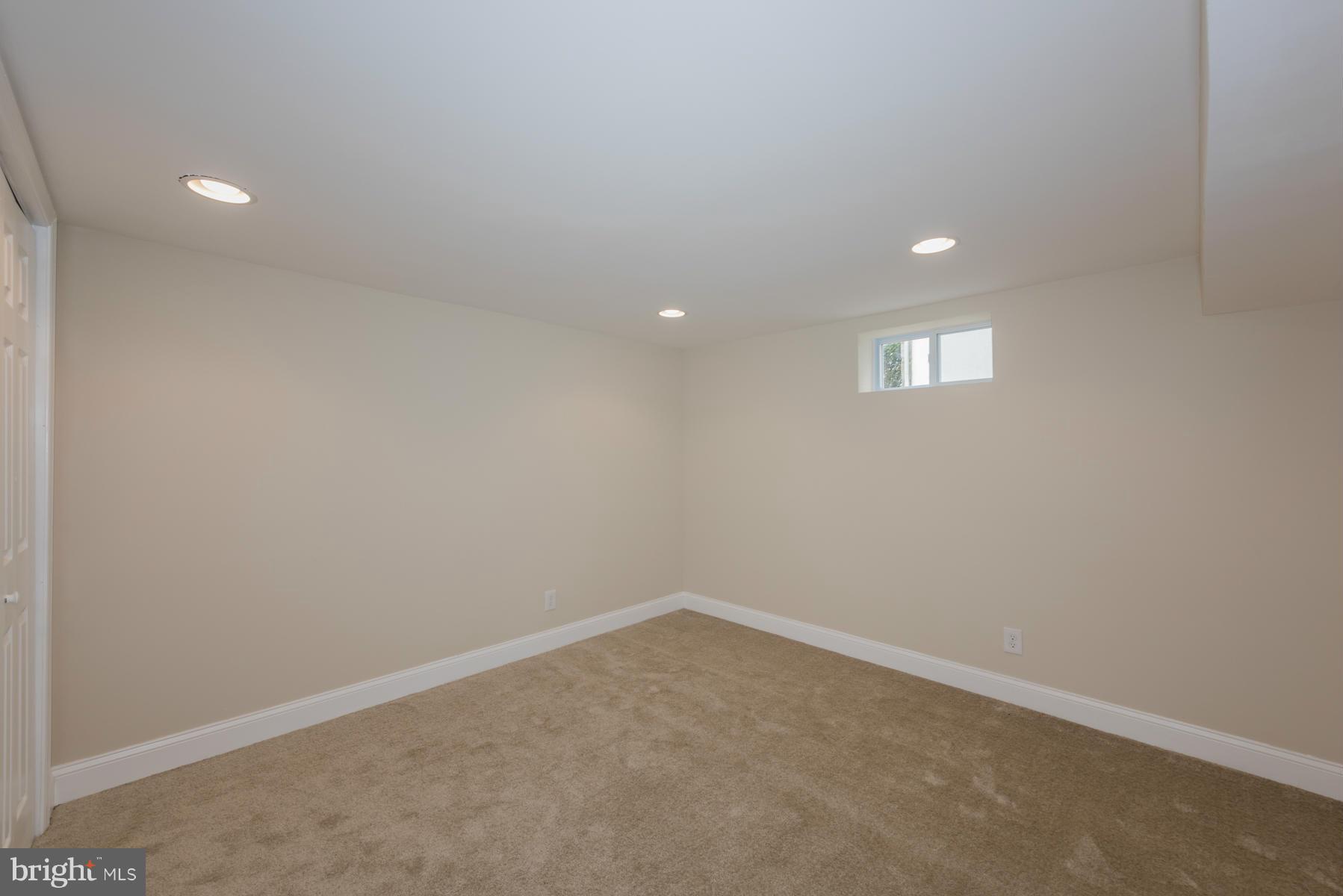 3812 Collier Road Randallstown, MD 21133 - Photo 20 of 27 a view of an empty room with a window
