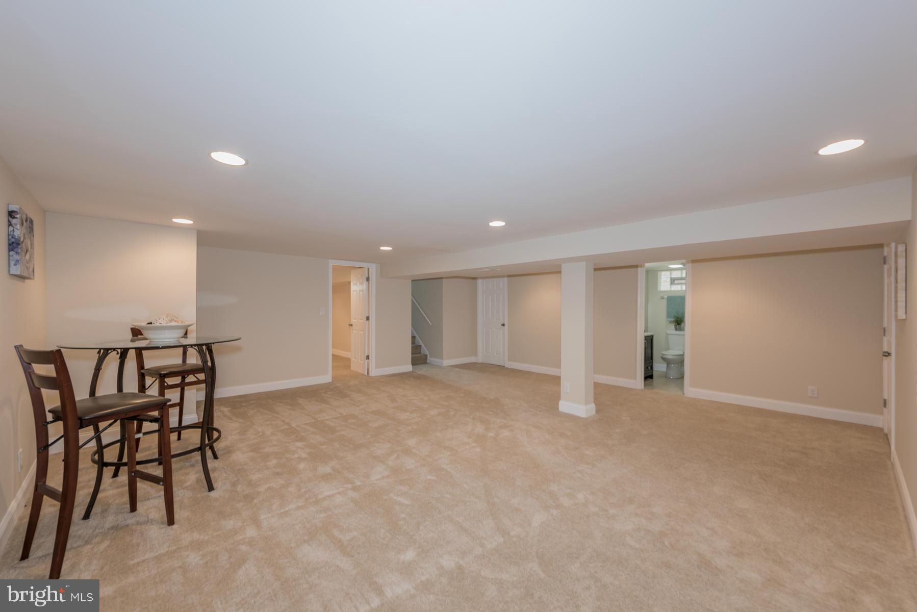 3812 Collier Road Randallstown, MD 21133 - Photo 23 of 27 an empty room with furniture and windows