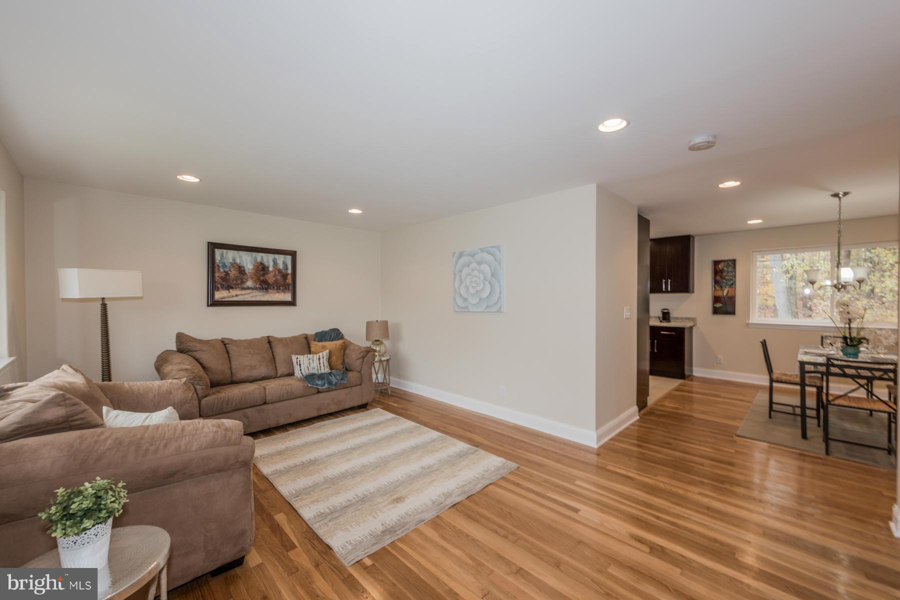 3812 Collier Road Randallstown, MD 21133 - Photo 3 of 27 a living room with furniture and a wooden floor