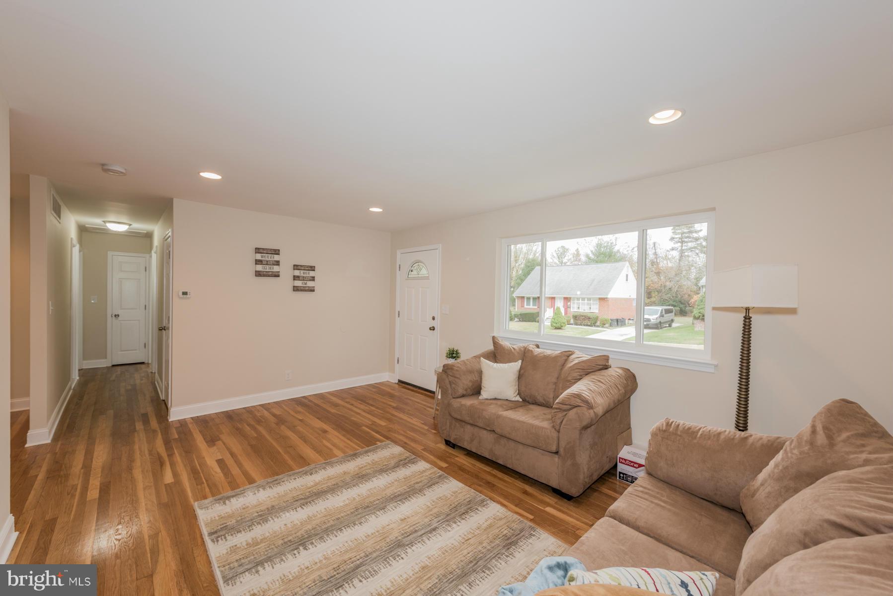 3812 Collier Road Randallstown, MD 21133 - Photo 4 of 27 a living room with furniture and a large window