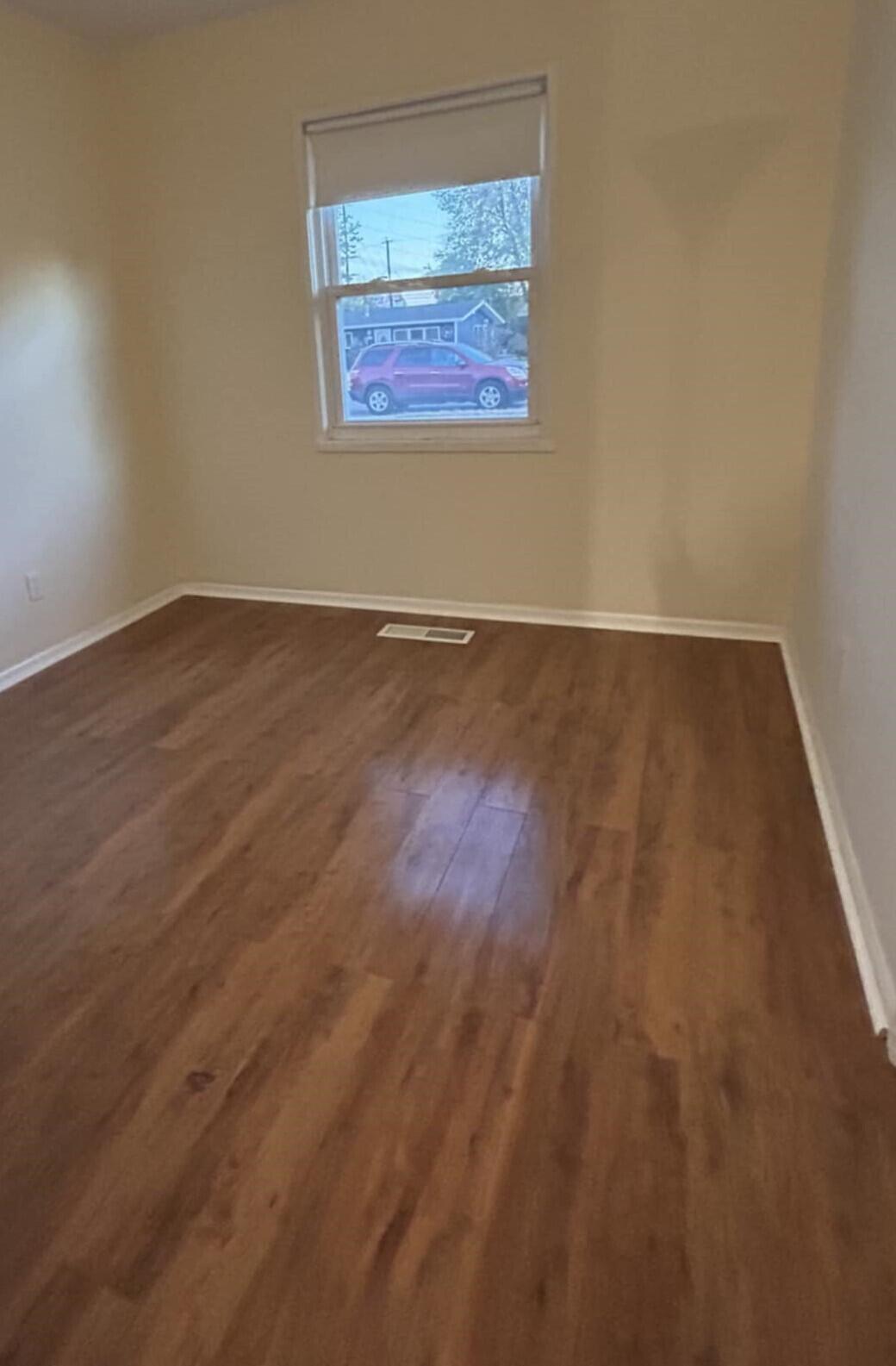 3339 176th Place Hammond, IN 46323 - Photo 11 of 16 wooden floor in an empty room
