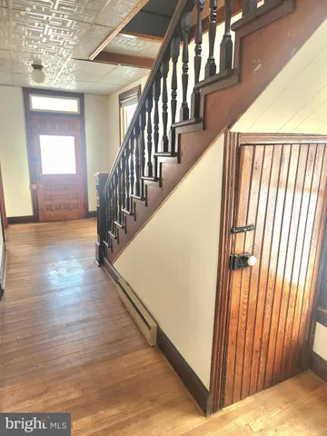 a view of livingroom with furniture wooden floor and window