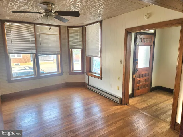 a view of livingroom with hardwood floor and window
