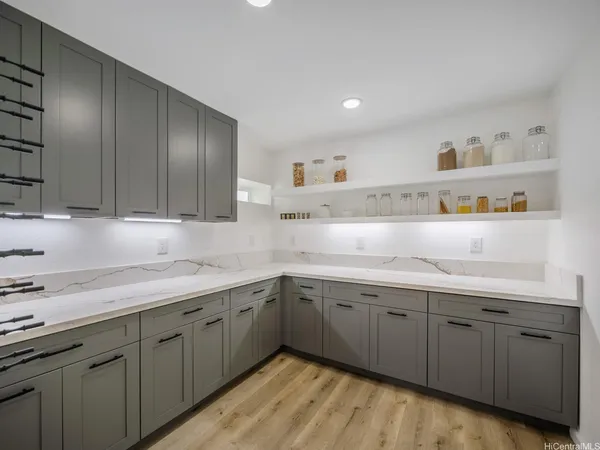 a kitchen with cabinets a sink and dishwasher
