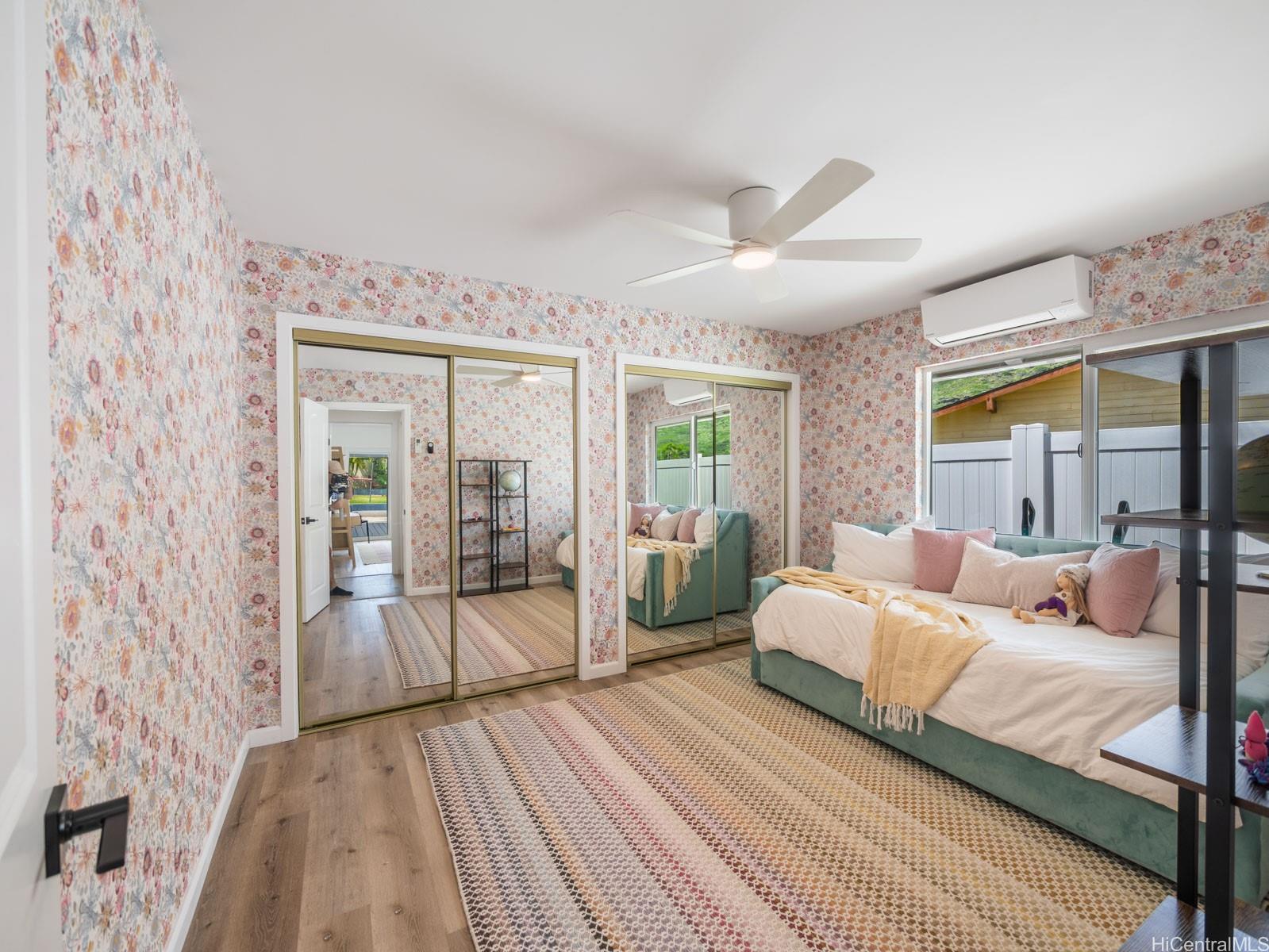 6815 Niumalu Loop Honolulu, HI 96825 - Photo 15 of 25 Downstairs Bedroom #2 with two closets and Split AC
