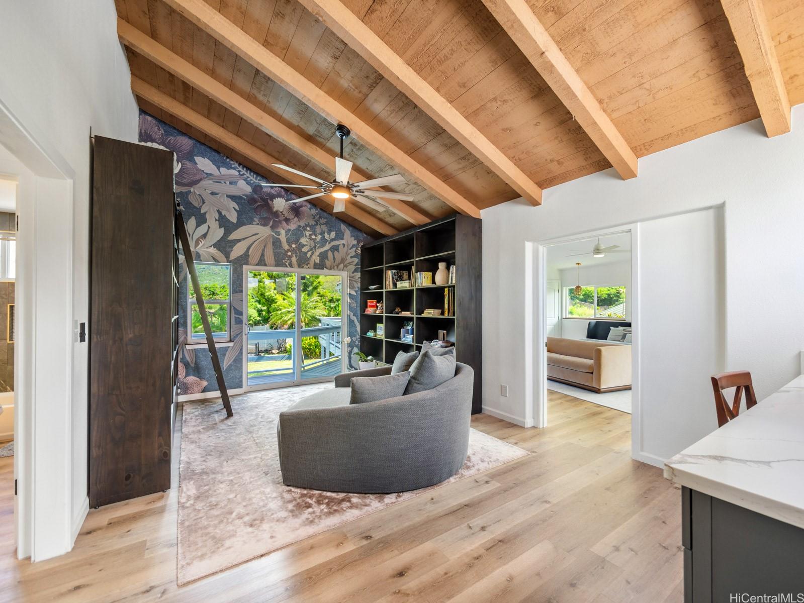 6815 Niumalu Loop Honolulu, HI 96825 - Photo 17 of 25 2nd floor is separated by this beautiful Den with vaulted ceilings and mountain and Pool Deck views