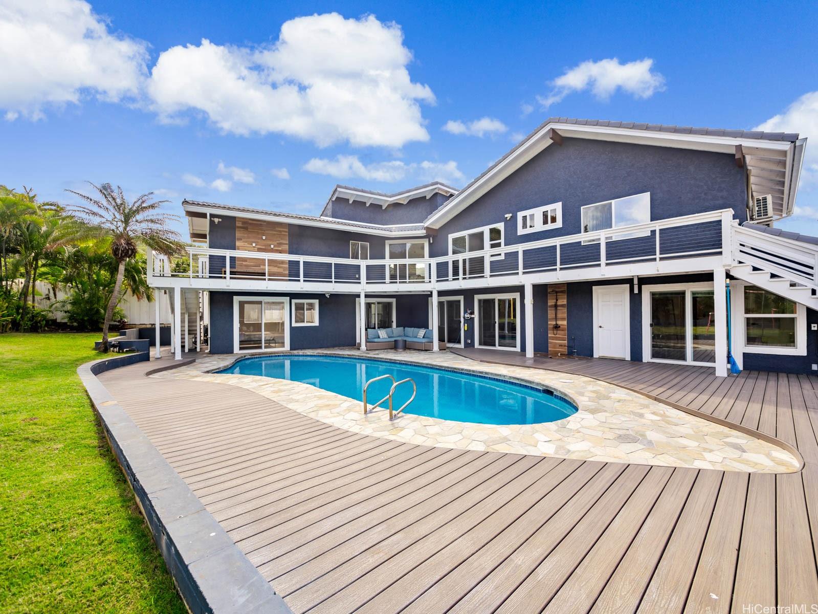 6815 Niumalu Loop Honolulu, HI 96825 - Photo 23 of 25 Pool deck is surrounded by Trex decking which is easy to clean, resistant to fading, staining, scratching and deterioration from moisture and mold