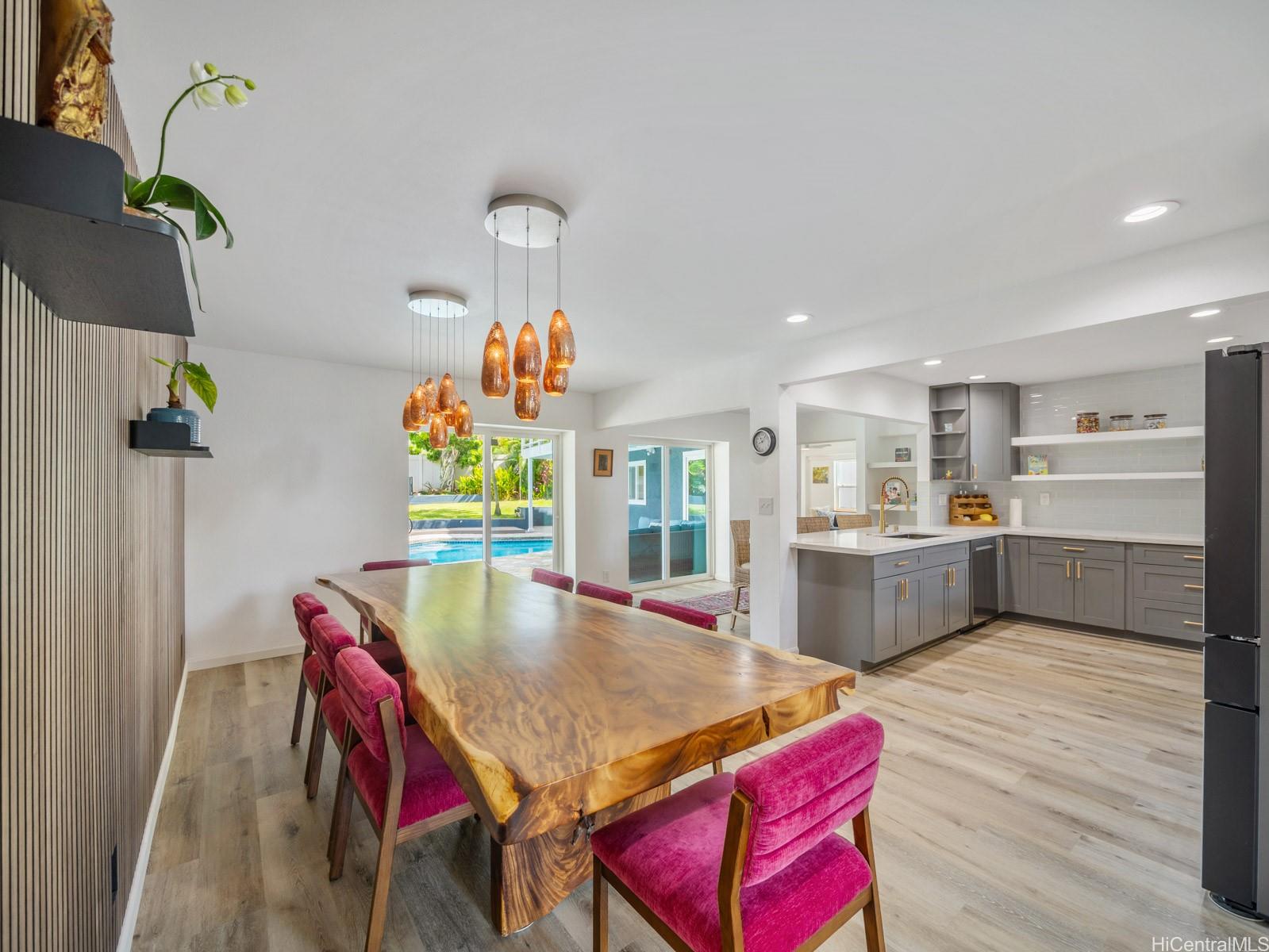 6815 Niumalu Loop Honolulu, HI 96825 - Photo 7 of 25 Dining Area transitions seamlessly into Kitchen