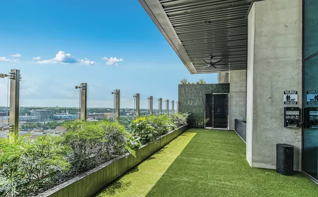 a view of a swimming pool with lounge chair