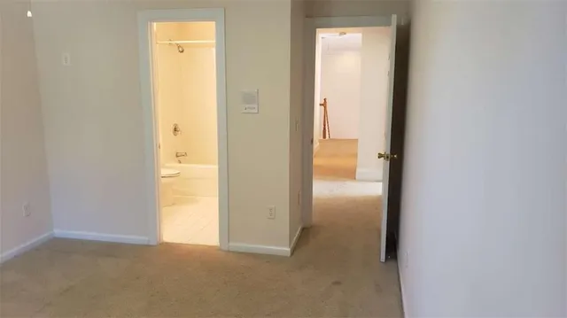 a bathroom with a sink vanity and mirror