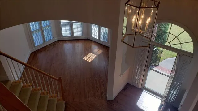 a view of staircase with large window