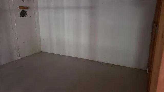 a view of porch with wooden floor