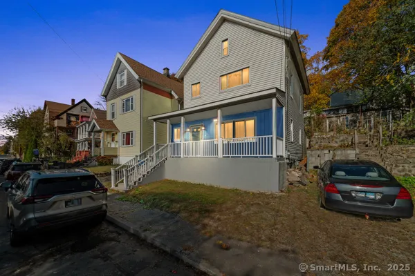 a car parked in front of a house