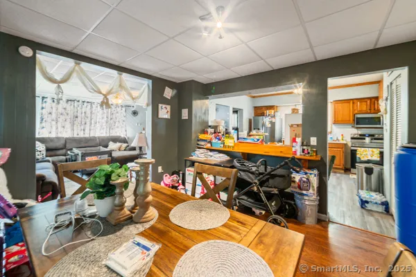 a room with musical instruments and wooden floor