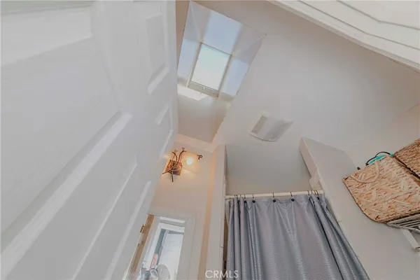 a view of a livingroom with furniture and stairs