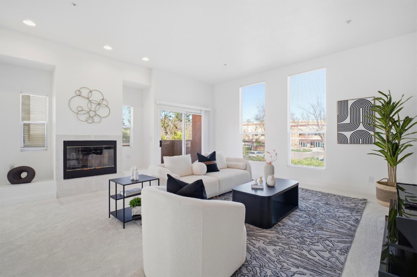 3950 Paul Terrace Fremont, CA 94538 - Photo 1 of 28 a living room with furniture a fireplace and a potted plant
